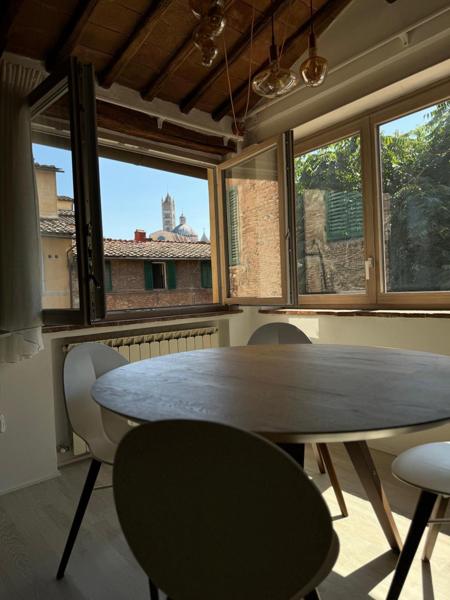 Teresa 91, Appartamento Incantevole Vista Duomo Siena Bagian luar foto